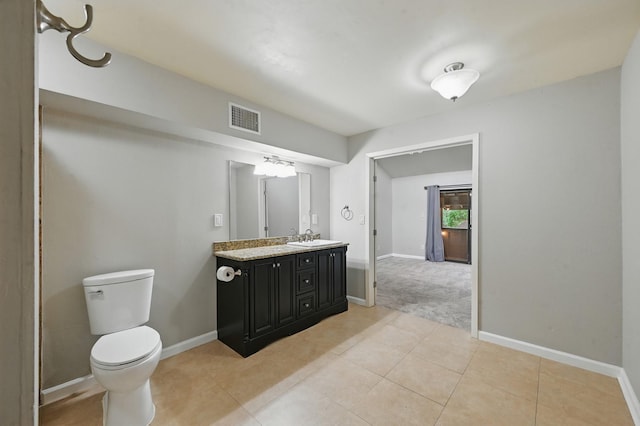 3189 Golden Oak Ct, Farmers Branch, TX 75234 - bathroom featuring vanity and tile patterned flooring