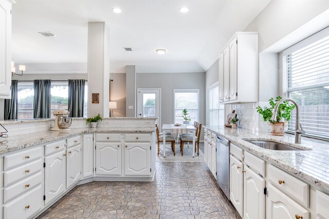 400 Patricia Ln, Highland Village, TX 75077 - kitchen with dishwasher, white cabinets, light stone countertops, recessed lighting, and tasteful backsplash