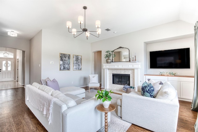 400 Patricia Ln, Highland Village, TX 75077 - living room featuring arched walkways, a chandelier, wood finished floors, and recessed lighting