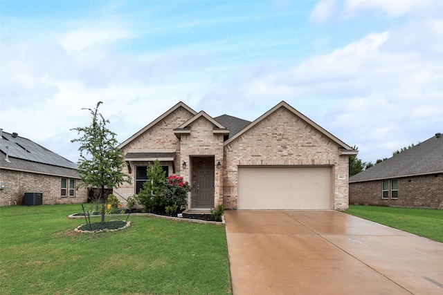 4003 Bendale Rd, Benbrook, TX 76116 - view of front of house with brick siding, an attached garage, concrete driveway, and a front lawn