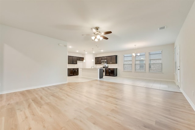 4003 Bendale Rd, Benbrook, TX 76116 - unfurnished living room featuring ceiling fan, light wood-style floors, and recessed lighting