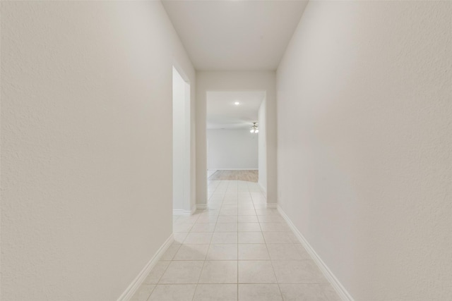 4003 Bendale Rd, Benbrook, TX 76116 - hallway with light tile patterned floors and baseboards