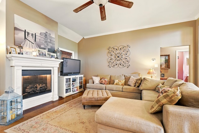 2157 Republic Ave, Abilene, TX 79601 - living room featuring ceiling fan, crown molding, a glass covered fireplace, wood finished floors, and lofted ceiling