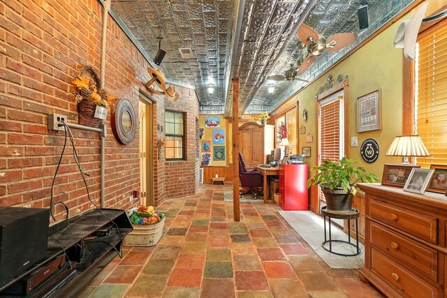 2157 Republic Ave, Abilene, TX 79601 - office featuring brick wall and stone finish floors