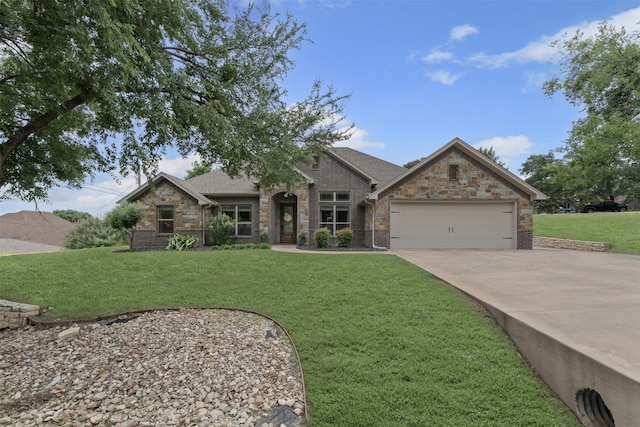 6202 Carrizo Dr, De Cordova, TX 76049 - view of front facade featuring an attached garage, concrete driveway, a front lawn, stone siding, and brick siding