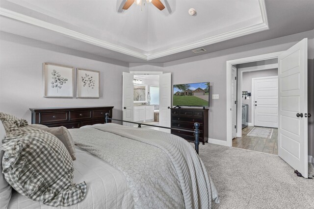 6202 Carrizo Dr, De Cordova, TX 76049 - bedroom featuring carpet floors, a raised ceiling, ensuite bath, and a ceiling fan