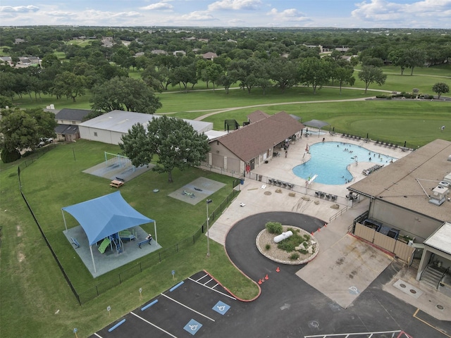 6202 Carrizo Dr, De Cordova, TX 76049 - aerial view of a pool area and a tree filled landscape