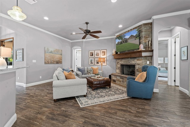 6202 Carrizo Dr, De Cordova, TX 76049 - living room with arched walkways, recessed lighting, dark wood-type flooring, ceiling fan, and a fireplace