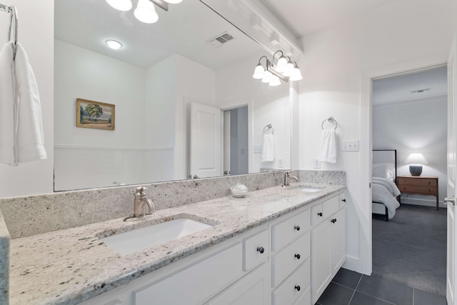 412 S Benge St, Mckinney, TX 75069 - ensuite bathroom featuring double vanity and tile patterned floors