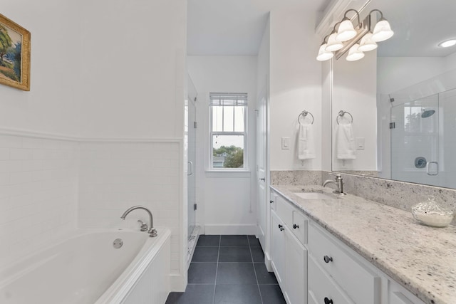 412 S Benge St, Mckinney, TX 75069 - bathroom with tile patterned floors, vanity, a stall shower, and a garden tub