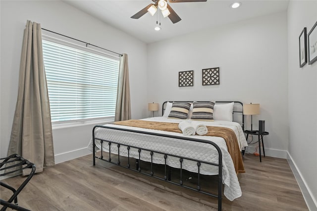 532 W Florence St, Denison, TX 75020 - bedroom with wood finished floors, recessed lighting, and ceiling fan