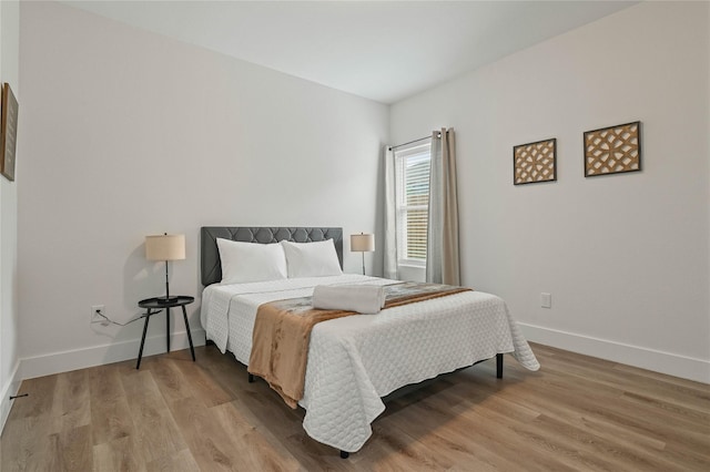532 W Florence St, Denison, TX 75020 - bedroom with light wood-type flooring