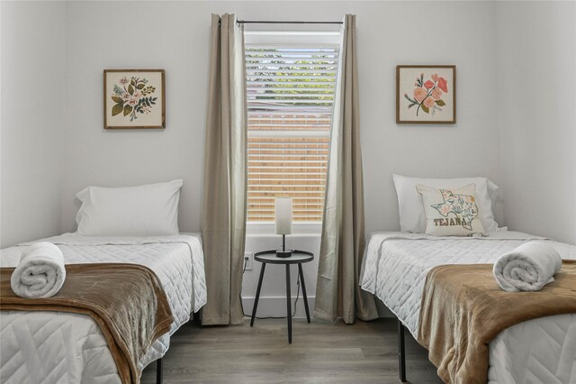 532 W Florence St, Denison, TX 75020 - bedroom featuring wood finished floors