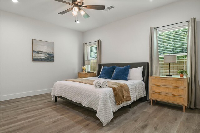 532 W Florence St, Denison, TX 75020 - bedroom with light wood-style floors, ceiling fan, and recessed lighting