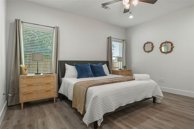 532 W Florence St, Denison, TX 75020 - bedroom with wood finished floors, a ceiling fan, and recessed lighting
