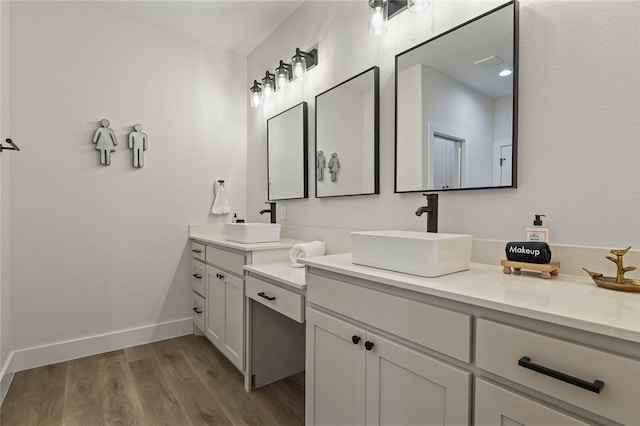 532 W Florence St, Denison, TX 75020 - full bath with vanity and wood finished floors