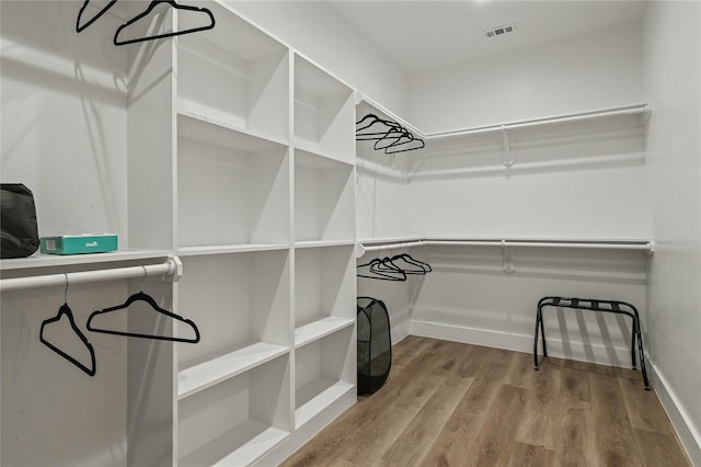 532 W Florence St, Denison, TX 75020 - walk in closet featuring wood finished floors