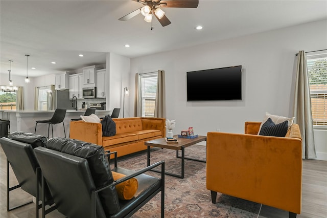 532 W Florence St, Denison, TX 75020 - living area with ceiling fan, recessed lighting, and wood finished floors