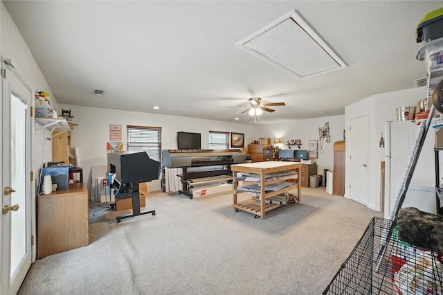 4328 Coryell Way, Mesquite, TX 75150 - living area with attic access, a ceiling fan, and carpet flooring