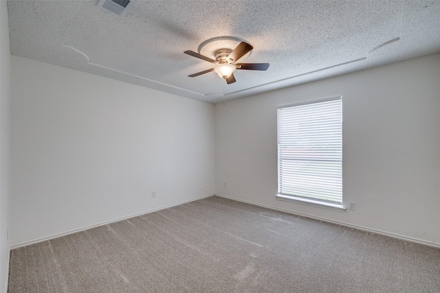 5125 Yucca Ct, Arlington, TX 76017 - empty room with a ceiling fan, carpet flooring, and a textured ceiling