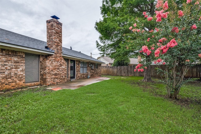 5125 Yucca Ct, Arlington, TX 76017 - fenced backyard with a patio area
