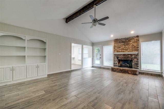 5125 Yucca Ct, Arlington, TX 76017 - unfurnished living room featuring ceiling fan, light wood-style floors, and a brick fireplace