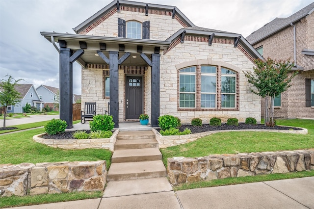 3418 River Trl, Frisco, TX 75034 - french country inspired facade featuring stone siding and a front yard
