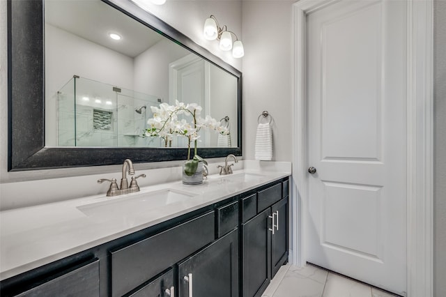 3418 River Trl, Frisco, TX 75034 - bathroom with marble look tile flooring, a shower stall, and double vanity