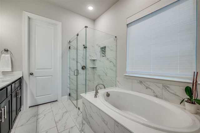 3418 River Trl, Frisco, TX 75034 - full bathroom featuring a garden tub, a marble finish shower, marble look tile flooring, and vanity