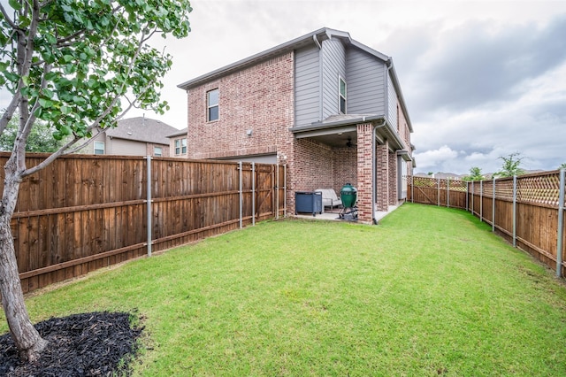 3418 River Trl, Frisco, TX 75034 - rear view of house featuring a fenced backyard, brick siding, and a patio