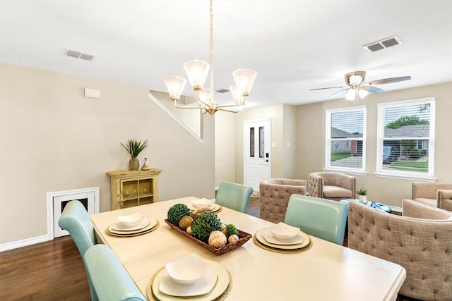 1837 Trego Dr, Fort Worth, TX 76247 - dining area with a chandelier, dark wood-style flooring, and a ceiling fan