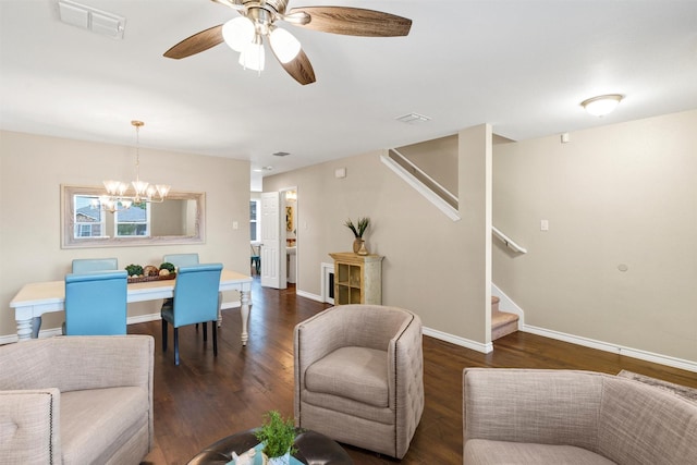 1837 Trego Dr, Fort Worth, TX 76247 - living area featuring stairway, a chandelier, wood finished floors, and a ceiling fan