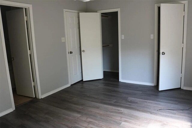 627 Cherry Ln, Southlake, TX 76092 - unfurnished bedroom featuring dark wood-type flooring and a closet