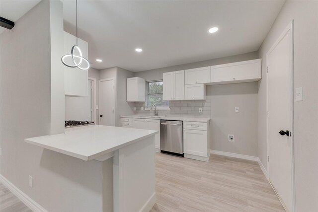 523 Frank Keasler, Duncanville, TX 75116 - kitchen featuring dishwasher, a peninsula, white cabinetry, light wood-style flooring, and recessed lighting