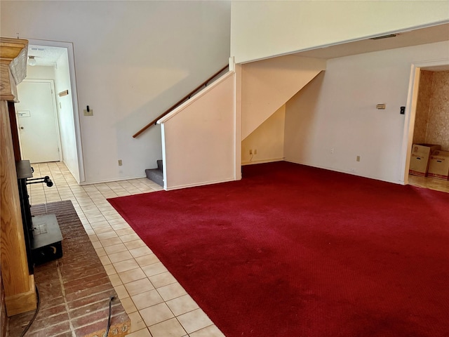 2909 Troy Rd, Wylie, TX 75098 - unfurnished living room with tile patterned flooring and stairway