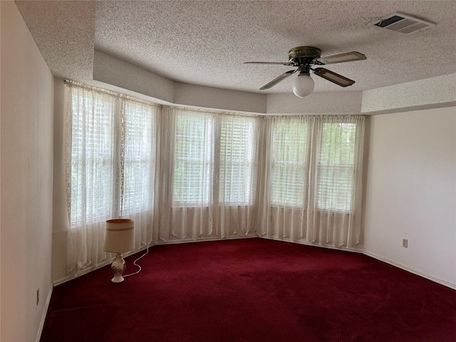 2909 Troy Rd, Wylie, TX 75098 - unfurnished room featuring carpet flooring, a ceiling fan, and a textured ceiling