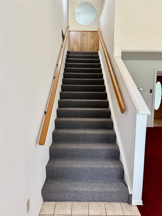 2909 Troy Rd, Wylie, TX 75098 - stairs featuring carpet and wooden walls