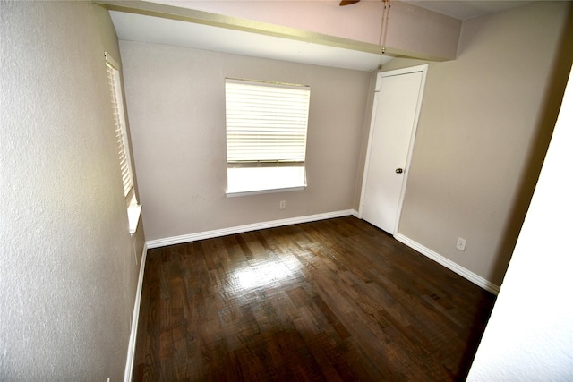 2625 Fairbrook St, Irving, TX 75062 - unfurnished room with dark wood-style flooring and a ceiling fan