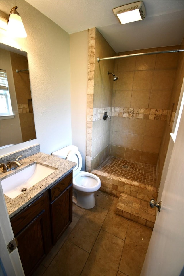 2625 Fairbrook St, Irving, TX 75062 - full bath featuring vanity and tiled shower