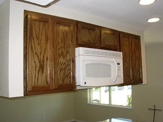2625 Fairbrook St, Irving, TX 75062 - kitchen with white microwave