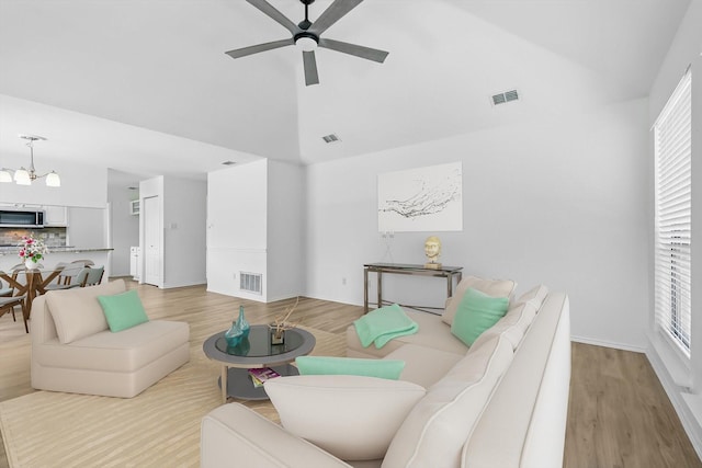 1800 Chatham Dr, Flower Mound, TX 75028 - living room with high vaulted ceiling, a ceiling fan, light wood-type flooring, and plenty of natural light