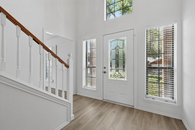 1800 Chatham Dr, Flower Mound, TX 75028 - foyer with stairs, wood finished floors, and a towering ceiling