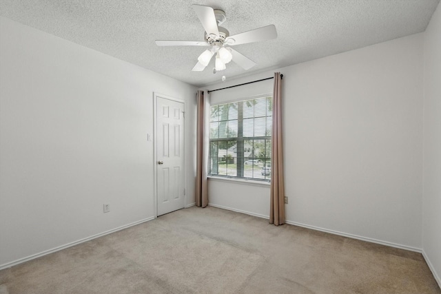1800 Chatham Dr, Flower Mound, TX 75028 - empty room featuring a textured ceiling, carpet, and a ceiling fan