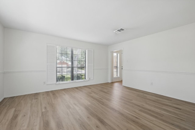1800 Chatham Dr, Flower Mound, TX 75028 - spare room with light wood finished floors and baseboards