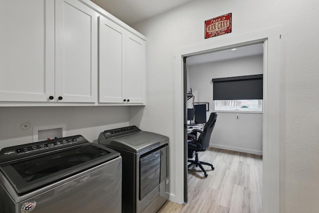 600 Reese Ln, Azle, TX 76020 - washroom with cabinet space, washing machine and dryer, light wood finished floors, and a desk