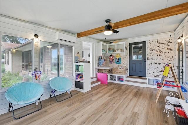 600 Reese Ln, Azle, TX 76020 - rec room with a wall mounted AC, wood finished floors, beam ceiling, and a ceiling fan
