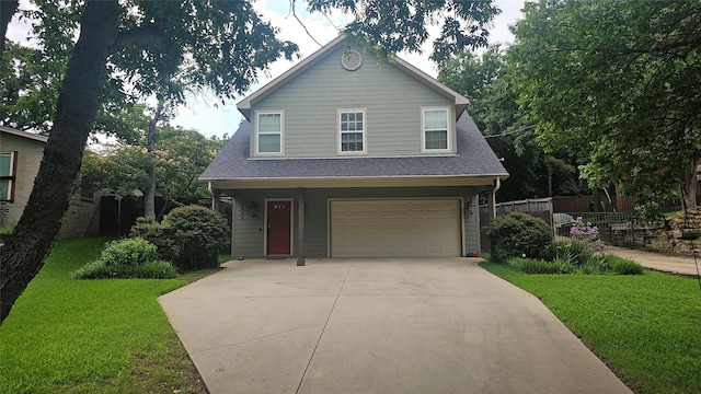 3428 Red Bird Ln, Grapevine, TX 76051 - view of front of property with an attached garage, driveway, and a shingled roof