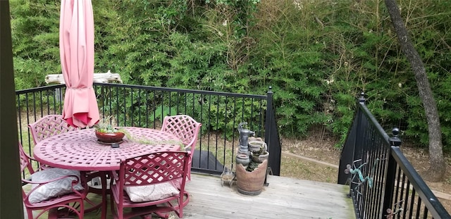 3428 Red Bird Ln, Grapevine, TX 76051 - wooden terrace with outdoor dining space