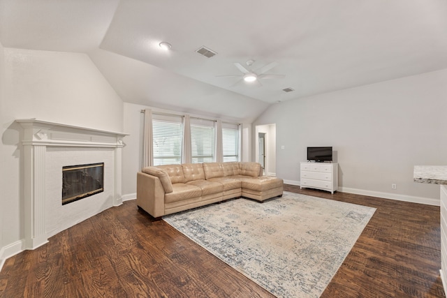 2600 Shiloh Rd, Denton, TX 76210 - living room featuring a ceiling fan, lofted ceiling, a glass covered fireplace, and dark wood finished floors