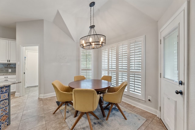 2600 Shiloh Rd, Denton, TX 76210 - dining room with vaulted ceiling, a chandelier, and light tile patterned floors